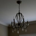 five-light-candle-style-dark-metal-glass-indoor-chandelier